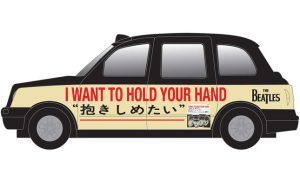 Main image for the Corgi CC85934 The Beatles London Taxi - I Want To Hold Your shown on a white background