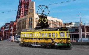 Main image for the Corgi OM44013 Brush Railcoach - Blackpool Transport 'Interflora' shown on a white background